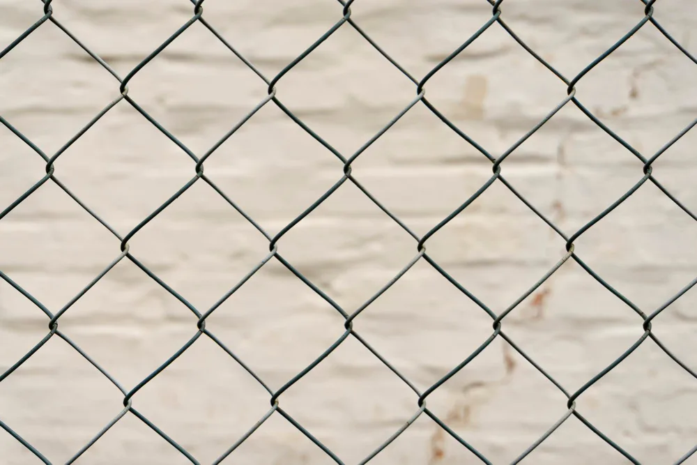 How to Maintain and Repair Your Chain Link Fence for Long-Term Durability