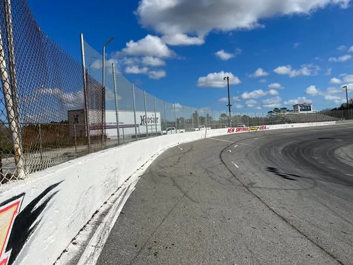 Old chain link fence beside the new replacement run at an Orlando speedway