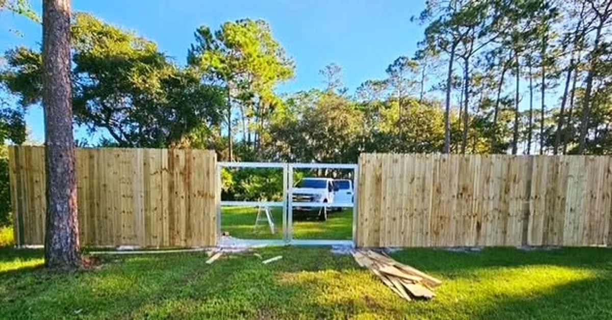 Wood privacy fence in Sanford during installation, before the run was finished